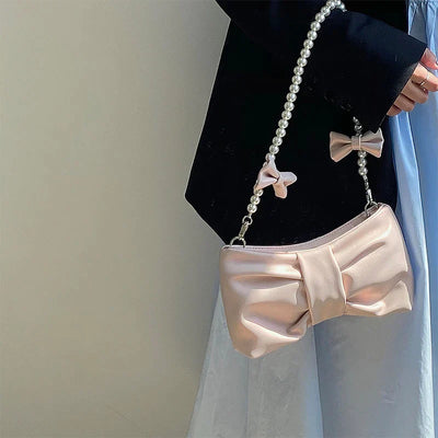 DolceMode | Satin Clutch mit Perlengriff