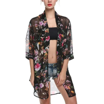 MODA lange zomer blouse met zwarte bloemenprint